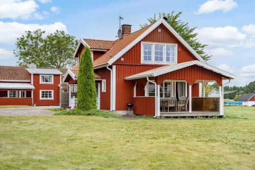 Lovely holiday home in the village of Flattinge, with a view of lake Flaren